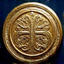 Symbole d'excellence, insigne doré avec motifs élégants